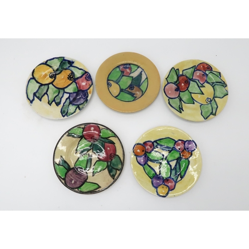 2183 - ELIZABETH MARY WATT (SCOTTISH 1886-1954)A collection of fruit painted pottery, including a plate, 24... 