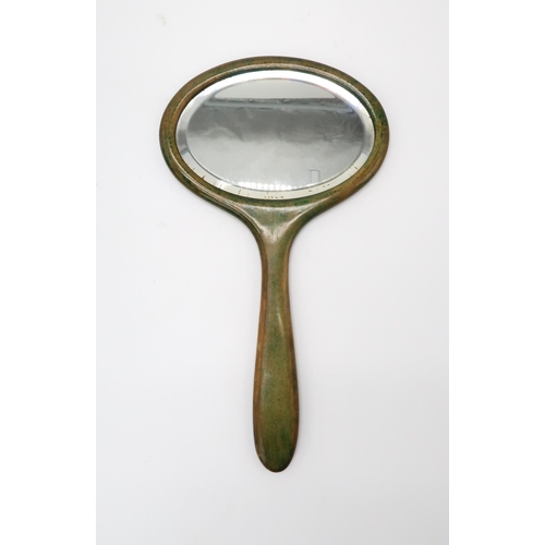 2189 - ELIZABETH MARY WATT (SCOTTISH 1886-1954)An unsigned hand painted wooden hand mirror with geometric d... 