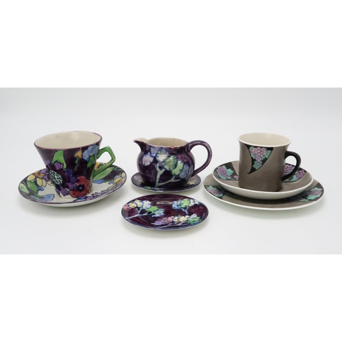 2190 - ELIZABETH MARY WATT (SCOTTISH 1886-1954)A small Honesty painted jug, two similar pin dishes/coasters... 