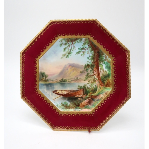 2203 - A COPELAND OCTAGONAL CABINET PLATEwith central painted continental lake scene within a burgundy and ... 