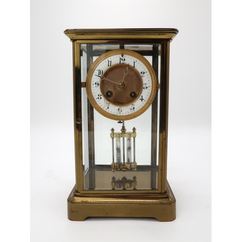 2206 - A MID 19TH CENTURY FRENCH BRASS AND GLASS MANTEL CLOCKthe white enamel dial with Arabic numerals, wi... 