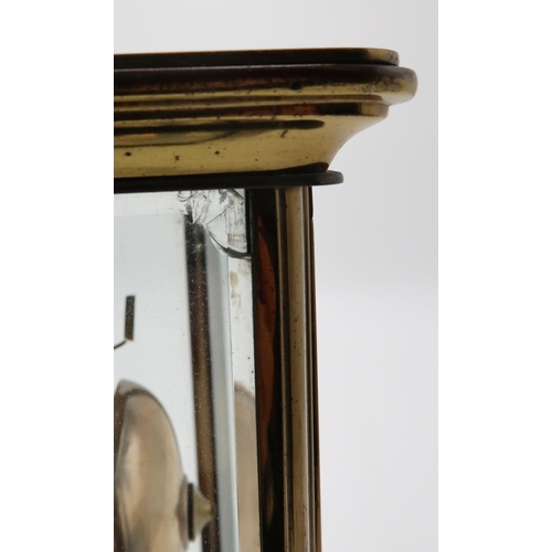 2206 - A MID 19TH CENTURY FRENCH BRASS AND GLASS MANTEL CLOCKthe white enamel dial with Arabic numerals, wi... 