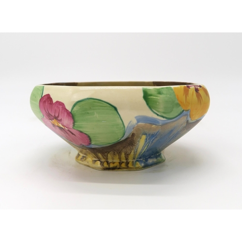 2219 - A CLARICE CLIFF PANSIES PATTERN BOWLof octagonal form, printed and painted marks to base, 14cm diame... 