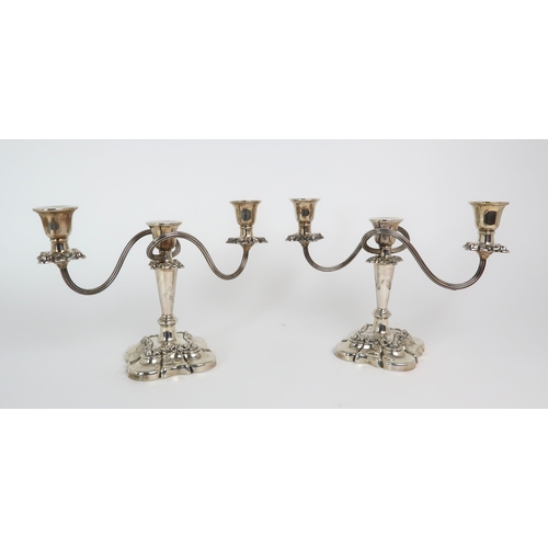 2451 - A PAIR OF ELIZABETH II TWIN BRANCH SILVER CANDELABRAby Ellis & Co, Birmingham 1958, the tapering... 