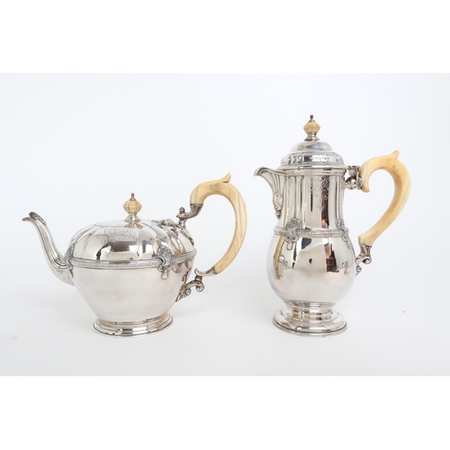 2453 - A MATCHED GEORGE V HEAVY GAUGE FOUR PIECE SILVER TEA SERVICEBy Adie Brothers Ltd, London 1927, the c... 