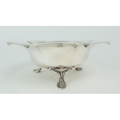 2456 - AN ART NOUVEAU SILVER FOOTED BOWLby Atkins Brothers, Sheffield 1902, of lobed form, with a slightly ... 