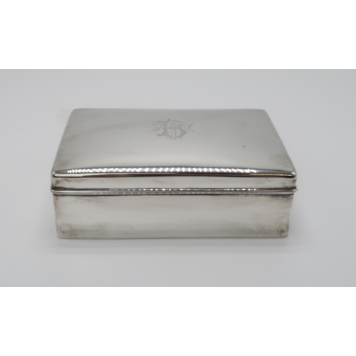 2462 - A CHINESE EXPORT SILVER CIGAR BOXby Wang Hing, of rectangular form, the lid monogrammed 'TB', with a... 