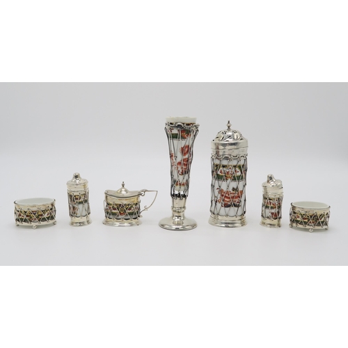 2466 - AN EDWARDIAN SILVER MOUNTED PORCELAIN CRUET SETthe porcelain by Copelands Spode, in an Imari palette... 