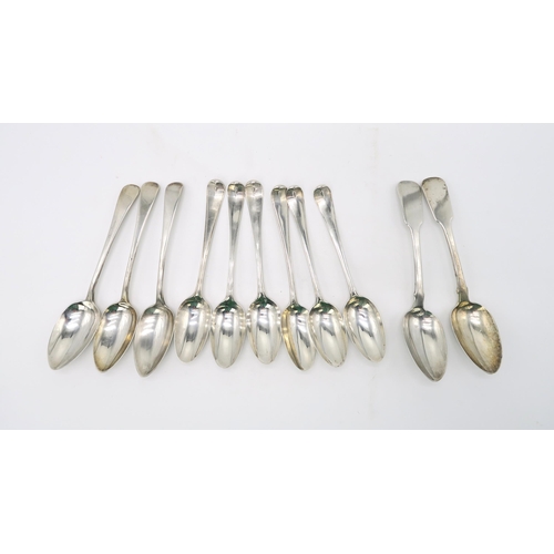 2473 - A COLLECTION OF GEORGIAN SILVER FLATWAREincluding four Hanoverian pattern tablespoons, by George Smi... 