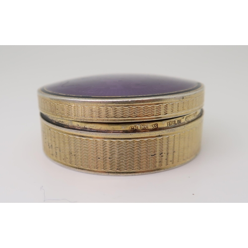 2479 - LOUIS KUPPENHEIM;A German Art Deco silver gilt and violet guilloche enamel box, the lid decorated wi... 