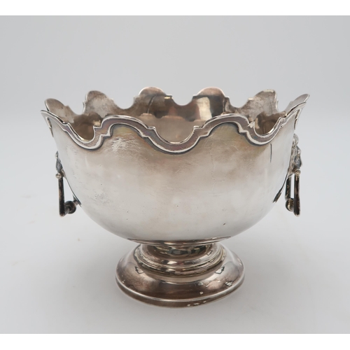 2481 - AN EDWARDIAN SILVER MONTEITHby Walker & Hall, Sheffield 1904, of typical form, with lion mask ha... 