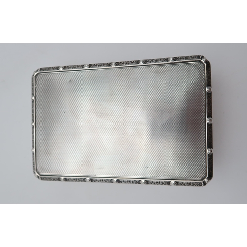 2484 - HAMILTON & INCHES;A George VI silver cigarette box, Edinburgh 1936, of canted rectangular form, ... 