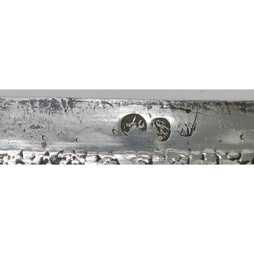 2487 - A PERSIAN SILVER TRAYof rectangular form, finely engraved with scrolling foliate decoration, with bi... 