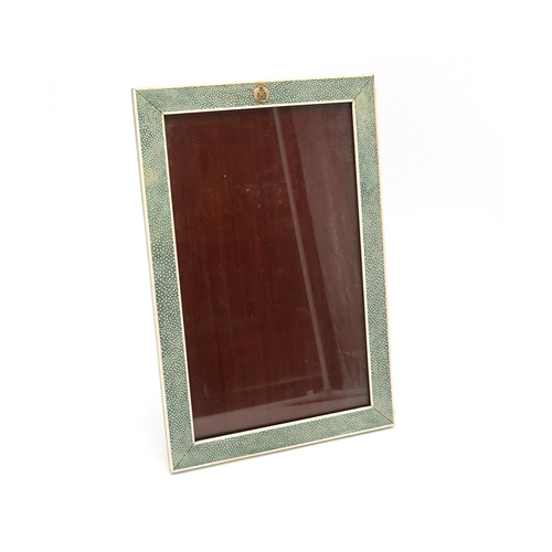 2550 - AN EARLY-20th CENTURY SHAGREEN AND IVORY-BANDED EASEL PHOTOGRAPH FRAMEMeasuring approx. 44.7cm x 29.... 