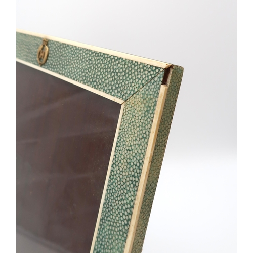 2550 - AN EARLY-20th CENTURY SHAGREEN AND IVORY-BANDED EASEL PHOTOGRAPH FRAMEMeasuring approx. 44.7cm x 29.... 