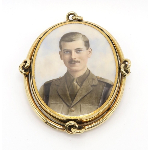 2553 - AN EARLY-20TH CENTURY PORTRAIT MINIATUREThe subject, a young man in military uniform, sporting a mou... 