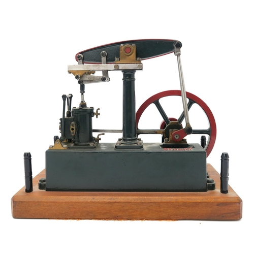 2567 - A STUART TURNER Ltd. LIVE STEAM MODEL BEAM ENGINEFitted with Watt's parallel motion, set upon a wood... 