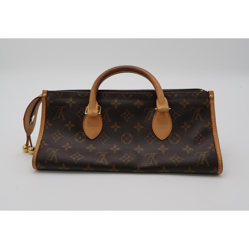 2579 - A LOUIS VUITTON M40009 BROWN MONOGRAM POPINCOURTwith a dust bag, length 30cm x 12cm height x 11cm wi... 