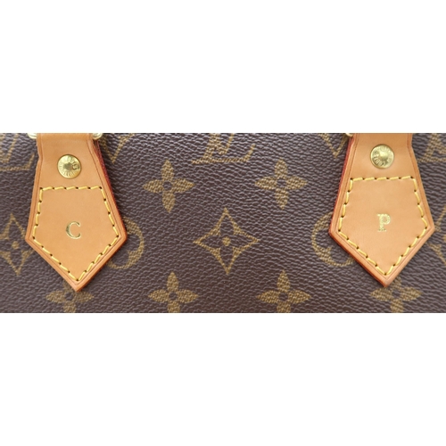 2580 - A LOUIS VUITTON M51130 BROWN MONOGRAM ALMAwith a dust bag, personalised to the leather 'C P', length... 