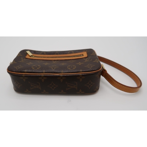 2584 - A LOUIS VUITTON M51183 BROWN MONOGRAM POCHETTE CITEwith a dust bag, length 21cm x height 11cm x widt... 