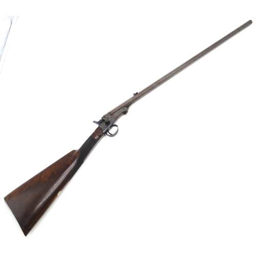 2621 - A NEEDLE-FIRE BREAK-BARREL RIFLE The browned steel octagonal barrel with Birmingham proof marks to u... 