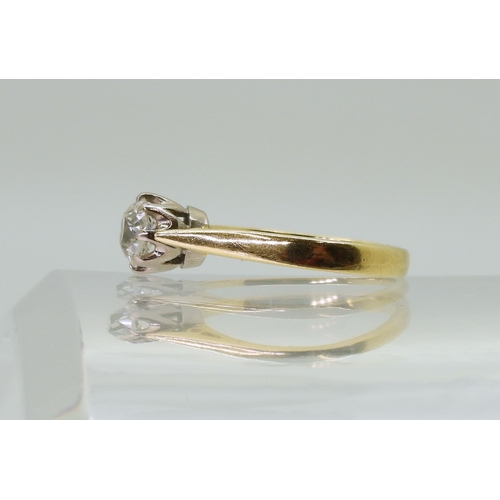 2706 - AN OLD CUT DIAMOND SOLITAIREthe 18ct yellow and white gold mount with classic crown setting, holding... 