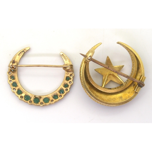 2715 - TWO CRESCENT MOON BROOCHESa bright yellow metal example with black enamel detail and set with split ... 