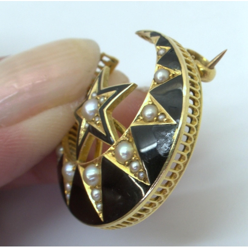 2715 - TWO CRESCENT MOON BROOCHESa bright yellow metal example with black enamel detail and set with split ... 