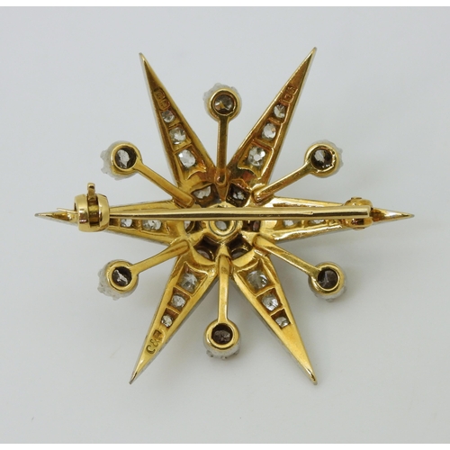 2721 - A DIAMOND STAR BROOCHmounted in 18ct yellow and white gold, set with estimated approx 1.12cts of bri... 