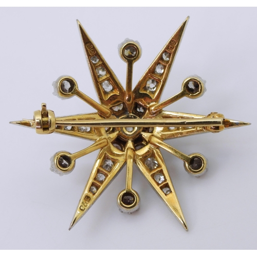 2721 - A DIAMOND STAR BROOCHmounted in 18ct yellow and white gold, set with estimated approx 1.12cts of bri... 