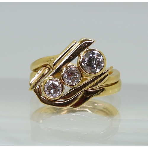 2725 - AN 18CT RETRO DIAMOND RING SETdesigned and made by The Ringmaker Edinburgh, circa 1997, the sculptur... 