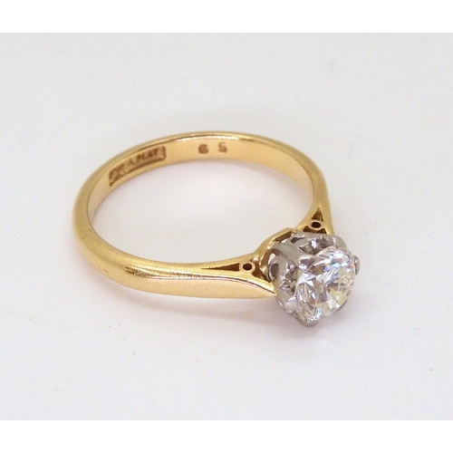 2730 - A DIAMOND SOLITAIREset in 18ct yellow and white gold with classic crown mount set with an estimated ... 