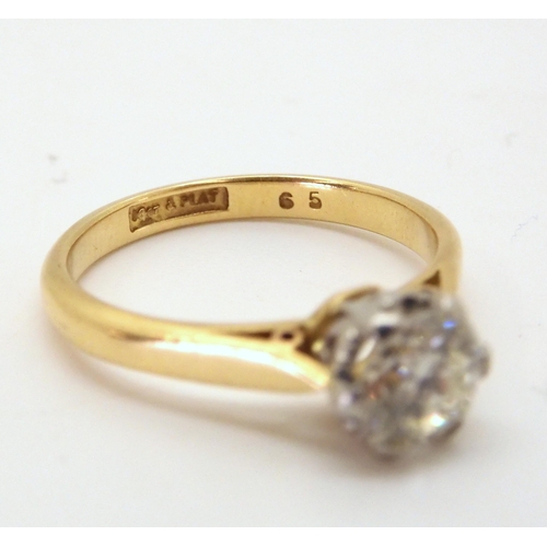 2730 - A DIAMOND SOLITAIREset in 18ct yellow and white gold with classic crown mount set with an estimated ... 