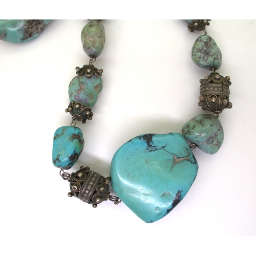 2731 - EGYPTIAN TURQUOISE JEWELSthe necklace with white metal beads with granulation detail, largest bead t... 