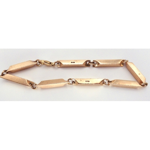 2755 - A RETRO 9CT GOLD BRACELETdesigned and made by Glasgow jeweller Eric Smith, the baton link bracelet h... 