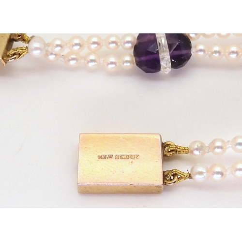 2762 - A VINTAGE AMETHYST HEARTS BRACELETthe amethyst hearts are split down the middle with a further clear... 