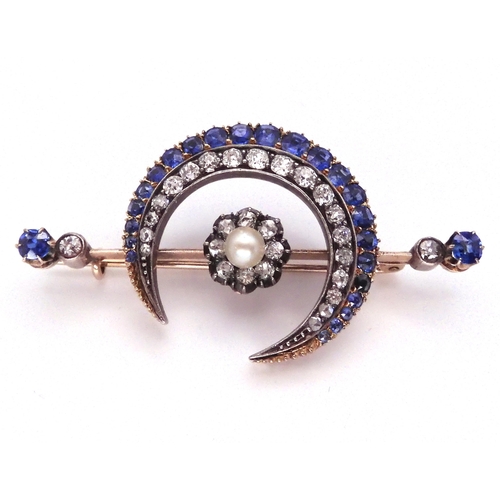 2767 - A SUBSTANTIAL CRESCENT MOON BROOCHset with diamonds a pearl and sapphires to the crescent, central f... 