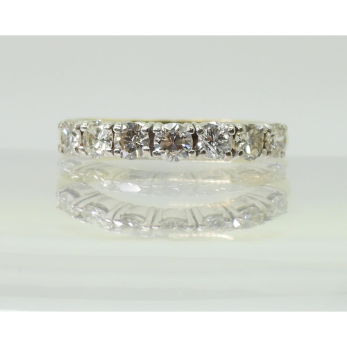 2779 - A HALF ETERNITY RINGmounted in 18ct yellow and white gold and set with estimated approx 1ct of brill... 