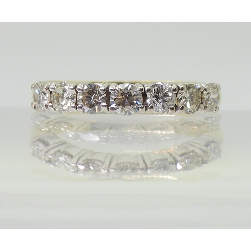 2779 - A HALF ETERNITY RINGmounted in 18ct yellow and white gold and set with estimated approx 1ct of brill... 