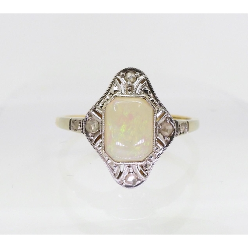 2840 - AN 18CT OPAL AND DIAMOND RINGset with a mixed cut opal with rose cut diamonds set to the pierced bez... 