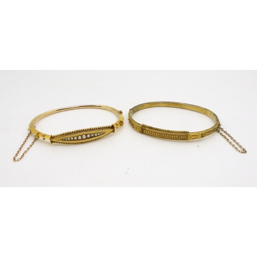 2844 - TWO VINTAGE BANGLESA 9ct gold bangle with wire work detail and set with a row of split pearls, stamp... 