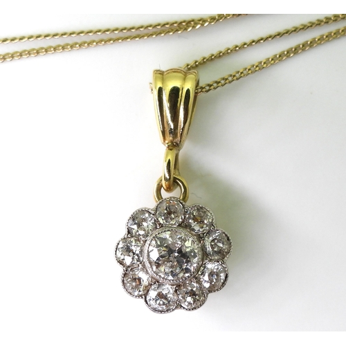 2849 - A DIAMOND FLOWER PENDANTin 14k gold mount, set with estimated approx 0.55cts of old cut diamonds, th... 