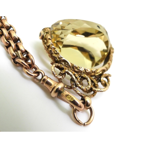 2851 - A 9CT GOLD GUARD CHAIN & FOBthe guard chain in classic facet cut belcher style with '9c' soldere... 