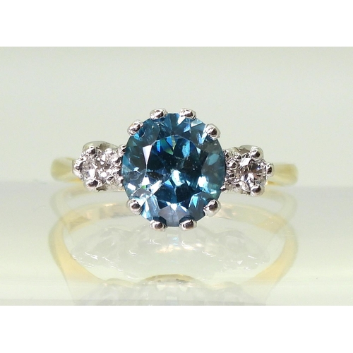 2853 - BLUE ZIRCON & DIAMOND RINGthe mount in 18ct yellow and white gold, set with a 7.6mm x 7mm x 4.6m... 