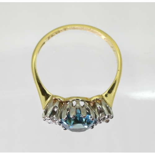 2853 - BLUE ZIRCON & DIAMOND RINGthe mount in 18ct yellow and white gold, set with a 7.6mm x 7mm x 4.6m... 