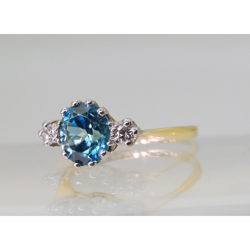 2853 - BLUE ZIRCON & DIAMOND RINGthe mount in 18ct yellow and white gold, set with a 7.6mm x 7mm x 4.6m... 