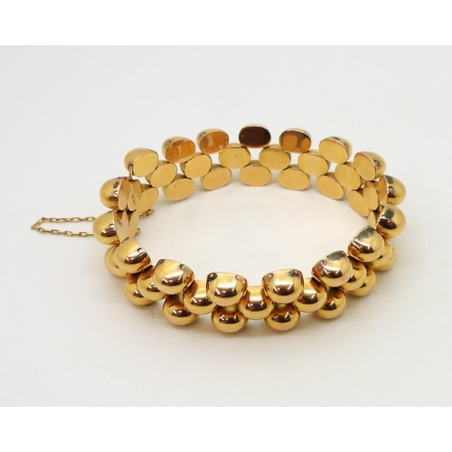 2854 - A FANCY GOLD BRACELETwith bobble pattern links and a hidden clasp, length 18.3cm, weight 43gms... 