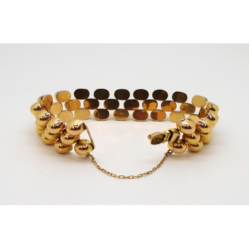 2854 - A FANCY GOLD BRACELETwith bobble pattern links and a hidden clasp, length 18.3cm, weight 43gms... 