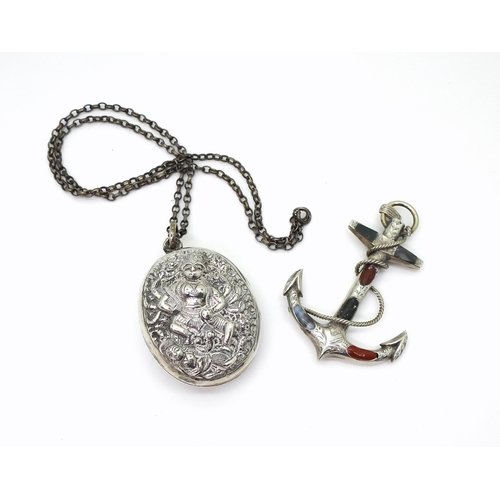 2855 - TWO VINTAGE ITEMSto include a Scottish agate inlaid Anchor pendant with engraved ground, dimensions ... 