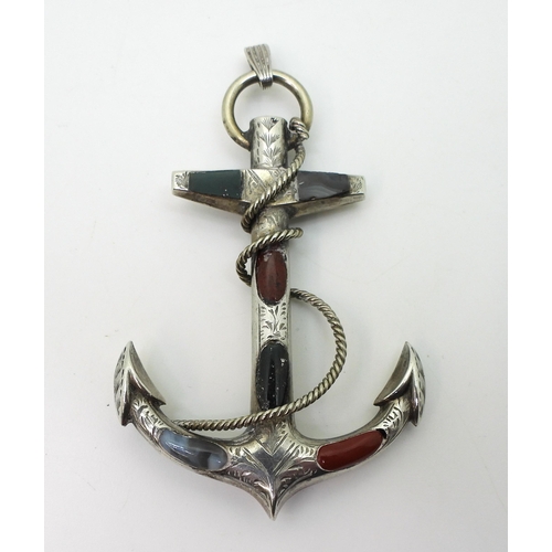 2855 - TWO VINTAGE ITEMSto include a Scottish agate inlaid Anchor pendant with engraved ground, dimensions ... 